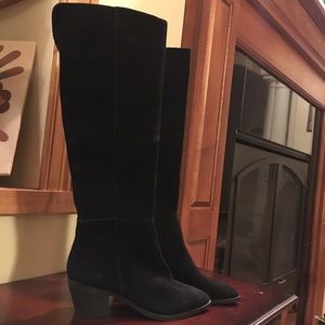 Brand new suede pair of knee high boots.